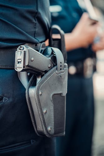 Gun secured in a holster